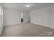 Bedroom with carpet, doors, and walk-in closet at 224 Old Harbor Dr, Mount Gilead, NC 27306