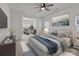 Serene bedroom with a plush bed, neutral color palette, and connecting sitting room at 224 Old Harbor Dr, Mount Gilead, NC 27306