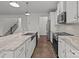 Stylish kitchen with marble countertops, stainless steel appliances, and a large island at 224 Old Harbor Dr, Mount Gilead, NC 27306