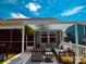 Inviting outdoor patio with comfortable seating under a stylish pergola and scenic views at 224 Old Harbor Dr, Mount Gilead, NC 27306