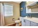 Nicely appointed bathroom featuring stylish fixtures, a bright window, and a modern vanity at 239 Bradford Glyn Dr, Mooresville, NC 28115