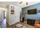 Finished bedroom featuring a TV, storage cabinet, and leather recliner at 239 Bradford Glyn Dr, Mooresville, NC 28115
