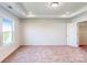 Bright bedroom includes a closet and a large window at 2792 Yeager Nw Dr, Concord, NC 28027