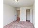 Bright bedroom with a walk-in closet and neutral carpet at 2792 Yeager Nw Dr, Concord, NC 28027