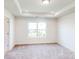 Spacious bedroom boasts natural light and plush carpeting at 2792 Yeager Nw Dr, Concord, NC 28027