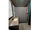 Eclectic bathroom with checkered shower curtain and bright, contrasting wall stripes at 291 Love Valley Rd, Statesville, NC 28625