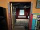View through the doorway of a quirky bedroom with vibrant colors and unique design at 291 Love Valley Rd, Statesville, NC 28625