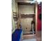 Bedroom closet with built in shelves and an open wooden design at 291 Love Valley Rd, Statesville, NC 28625