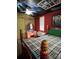 Fun bedroom featuring a unique ceiling mural, colorful accents, and comfortable bed at 291 Love Valley Rd, Statesville, NC 28625