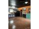 Open kitchen and living area with hardwood floors, black appliances and unique decor touches at 291 Love Valley Rd, Statesville, NC 28625