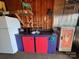 Small kitchenette area in a cabin, complete with a sink, microwave, and mini-fridge at 291 Love Valley Rd, Statesville, NC 28625