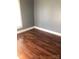 Bedroom showcasing new hardwood floors and neutral paint, exuding a sense of calm at 401 Plymouth St, Kannapolis, NC 28083