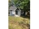 Charming single-story home with grey siding, white trim, and a well-maintained front yard at 401 Plymouth St, Kannapolis, NC 28083