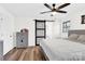 Cozy bedroom with a modern barn door and neutral decor at 403 Greenbriar S Rd, Statesville, NC 28625