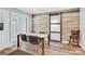 Stylish dining room with a sliding barn door, sleek table, and modern decor at 403 Greenbriar S Rd, Statesville, NC 28625