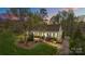 A beautiful aerial view showcases the home's manicured lawn and mature trees, providing great curb appeal at 405 Downing Dr, Kings Mountain, NC 28086