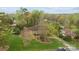Aerial view of a well-maintained home with lush landscaping, mature trees, and a sprawling green lawn at 405 Downing Dr, Kings Mountain, NC 28086