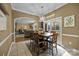 Light filled dining room offers access to the outdoor living space at 405 Downing Dr, Kings Mountain, NC 28086