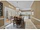 Open floor plan from the dining room through to the kitchen and outdoor spaces at 405 Downing Dr, Kings Mountain, NC 28086