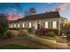 Charming single-story home features neat landscaping, a brick walkway, and a welcoming front entrance at 405 Downing Dr, Kings Mountain, NC 28086