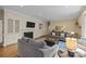 Cozy living room features a fireplace, built in cabinets and hardwood floors at 405 Downing Dr, Kings Mountain, NC 28086