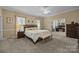 Spacious main bedroom suite featuring a comfortable bed and attached office space at 405 Downing Dr, Kings Mountain, NC 28086