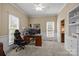 Office space with a neutral color palette, lots of light and plush carpeting at 405 Downing Dr, Kings Mountain, NC 28086