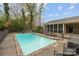 Inviting backyard pool with patio and screened porch; a perfect spot for relaxation and outdoor entertaining at 405 Downing Dr, Kings Mountain, NC 28086