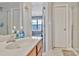 Bathroom vanity with bright lighting and an opening to an adjacent bedroom, shows a functional design at 4517 Sabin St, Rock Hill, SC 29732