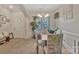 Bright dining room with neutral carpet, chandelier, and a decorative plant near the front door at 4517 Sabin St, Rock Hill, SC 29732