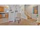 Open hallway with a staircase, a chair, and tasteful decor at 4517 Sabin St, Rock Hill, SC 29732