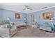 Spacious living room with a ceiling fan and comfortable seating showcases the home's cozy atmosphere at 4517 Sabin St, Rock Hill, SC 29732