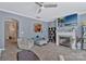 Bright living room features a TV, fireplace and view to the kitchen at 4517 Sabin St, Rock Hill, SC 29732