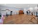 Large finished basement offers ample space for a home gym and office setup at 4637 Gold Finch Dr, Denver, NC 28037