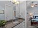 Bathroom features granite countertop vanity, updated lighting and ensuite access to bedroom at 4637 Gold Finch Dr, Denver, NC 28037