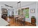 Inviting eat-in kitchen featuring an island with seating, views, and an adjacent living space at 4637 Gold Finch Dr, Denver, NC 28037