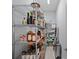 Walk-in pantry features metal shelving for food storage and household products at 4637 Gold Finch Dr, Denver, NC 28037