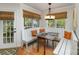 Charming breakfast nook with a built-in bench, natural light, and a cozy atmosphere at 481 Patriot Ne Ct, Concord, NC 28025