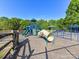 Fun playground area with slides, climbing structures, and swings, perfect for entertainment at 5043 Hickory Lake Ln, Matthews, NC 28105