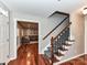 Staircase features hardwood floors, carpeted steps, and access to the living room at 5043 Hickory Lake Ln, Matthews, NC 28105