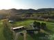 Expansive property featuring a charming home and outbuildings nestled among rolling hills and verdant pastures at 5373 Nc Hwy 16 N Hwy, Taylorsville, NC 28681