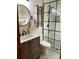 Modern bathroom featuring a sleek vanity, mirror, and a stylish glass-enclosed shower with black accents at 5373 Nc Hwy 16 N Hwy, Taylorsville, NC 28681