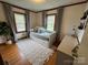 A charming bedroom filled with natural light from dual windows is perfect for children to unwind at 5373 Nc Hwy 16 N Hwy, Taylorsville, NC 28681