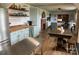 Inviting living space with an open floor plan, including a kitchen, dining area, and cozy lounge at 5373 Nc Hwy 16 N Hwy, Taylorsville, NC 28681