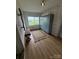 Inviting mudroom with white brick walls, lockers, bench, and a view of the outdoors from the window at 5373 Nc Hwy 16 N Hwy, Taylorsville, NC 28681