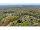 Stunning aerial view of the neighborhood showcasing expansive tree coverage and impressive residences at 5750 Hemby Rd, Matthews, NC 28104
