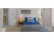 Bright bedroom with a large bed, bedside table, and ample natural light at 5750 Hemby Rd, Matthews, NC 28104