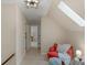 Hallway with sitting nook and skylight for ample light at 5750 Hemby Rd, Matthews, NC 28104