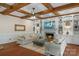 Elegant living room with coffered ceiling, built-in shelving, and cozy fireplace at 5750 Hemby Rd, Matthews, NC 28104