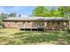 Backyard with deck and lawn at 600 Community Ln, Lancaster, SC 29720